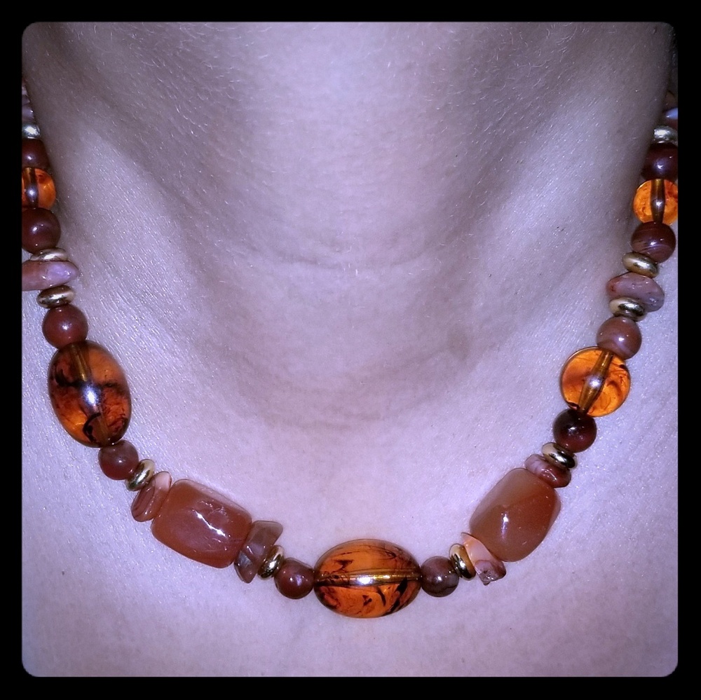 Orange jeweled necklace